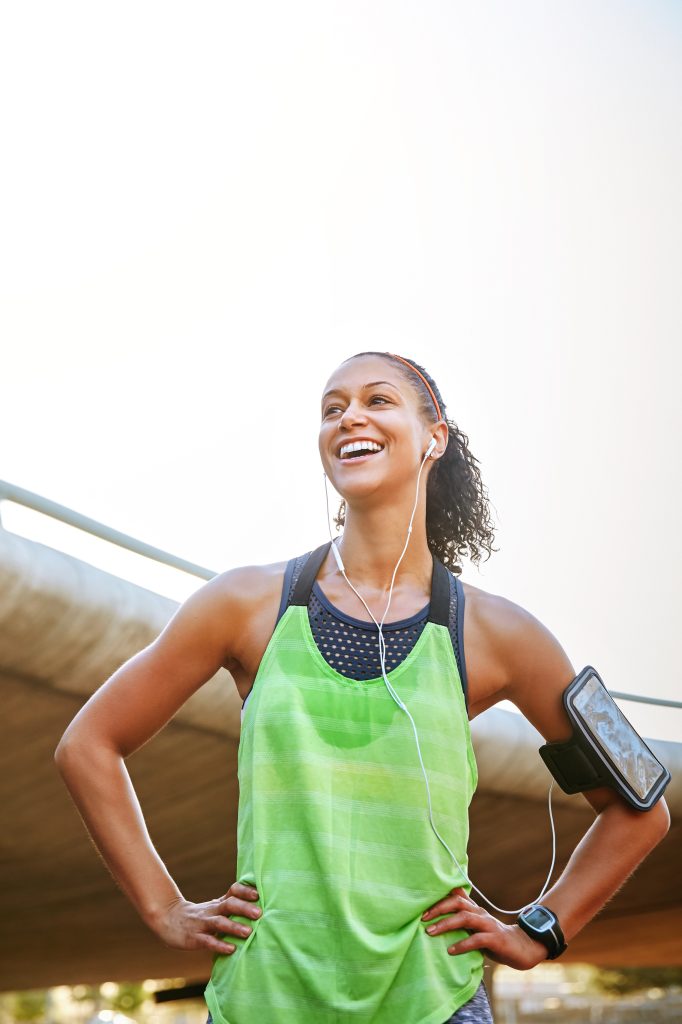 Great day for a great run. Shot of a sporty young woman exercisi