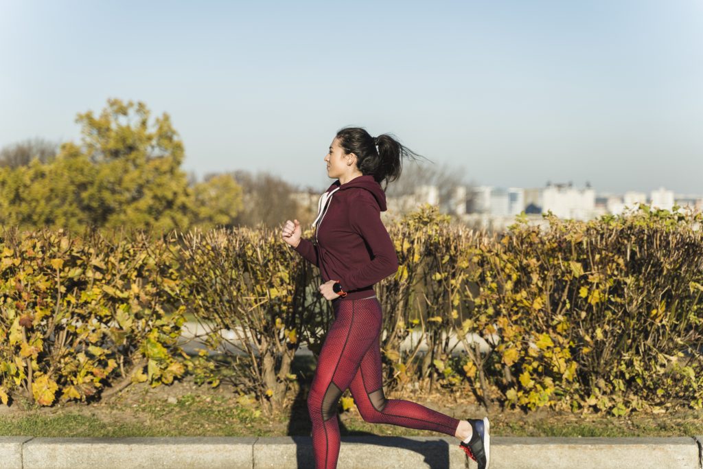 portrait-active-woman-jogging-outdoor
