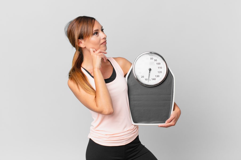 smiling happily and daydreaming or doubting