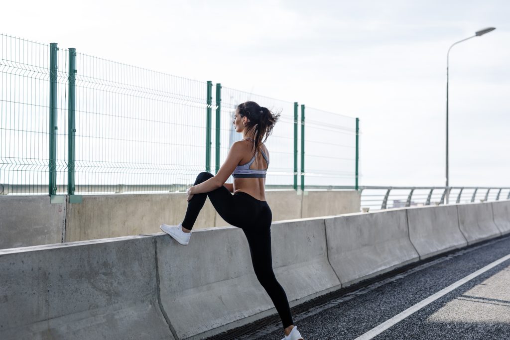 woman-exercising-bridge