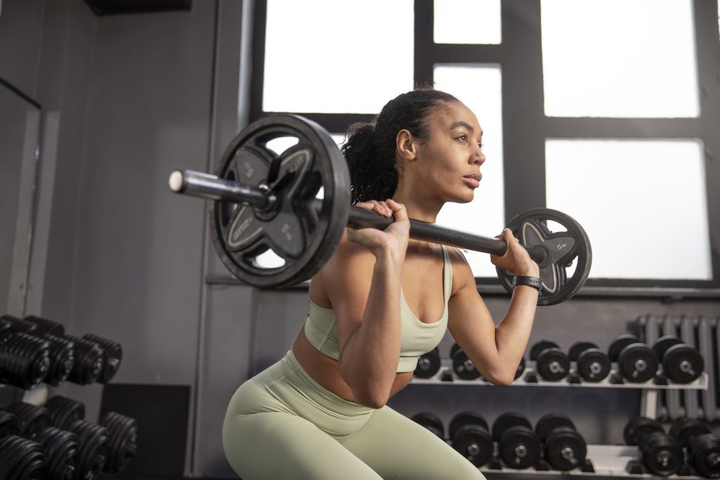 woman-training-weightlifting-gym