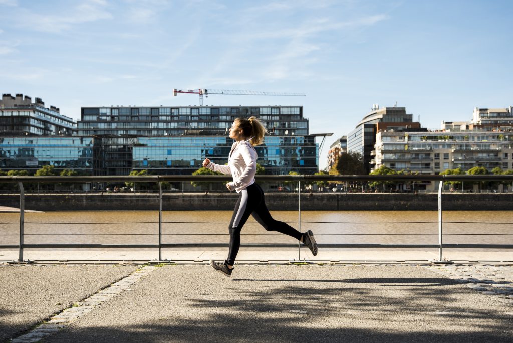 young-woman-running-outdoors-with-sportswear