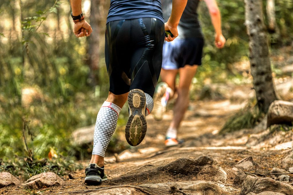 back man runner in compression socks